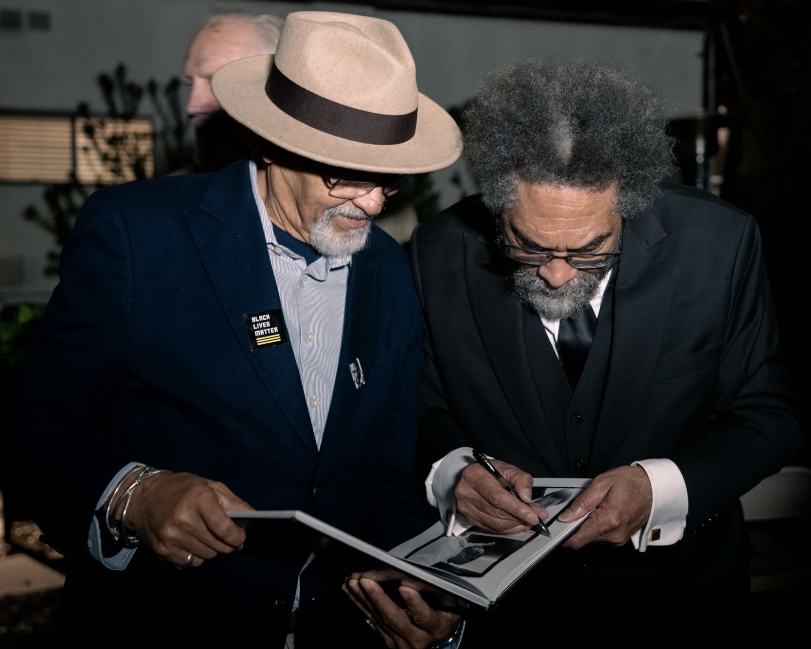 The signing — on the campaign trail